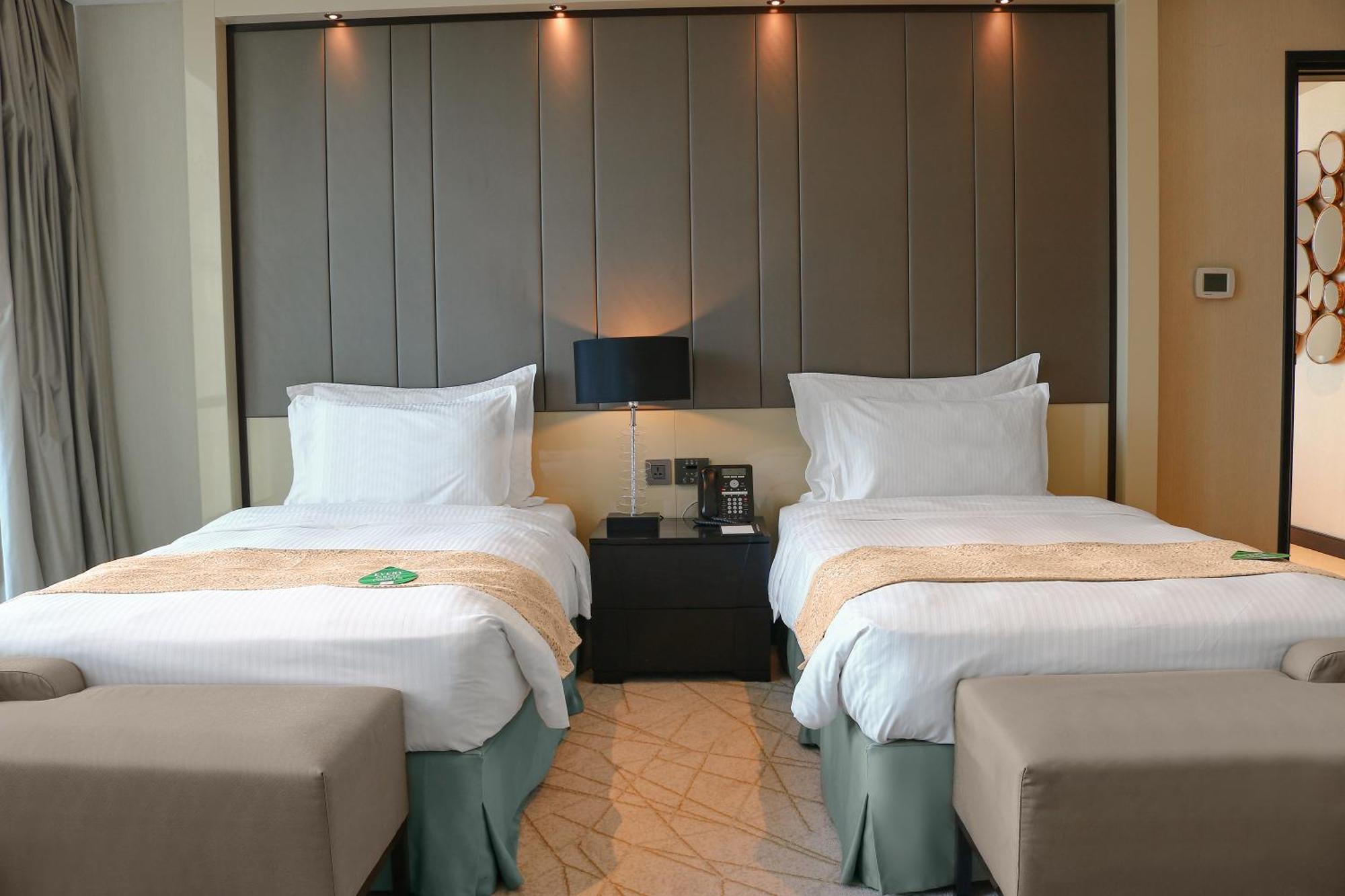 Millennium Plaza Doha Hotel Exterior photo A room at the hotel